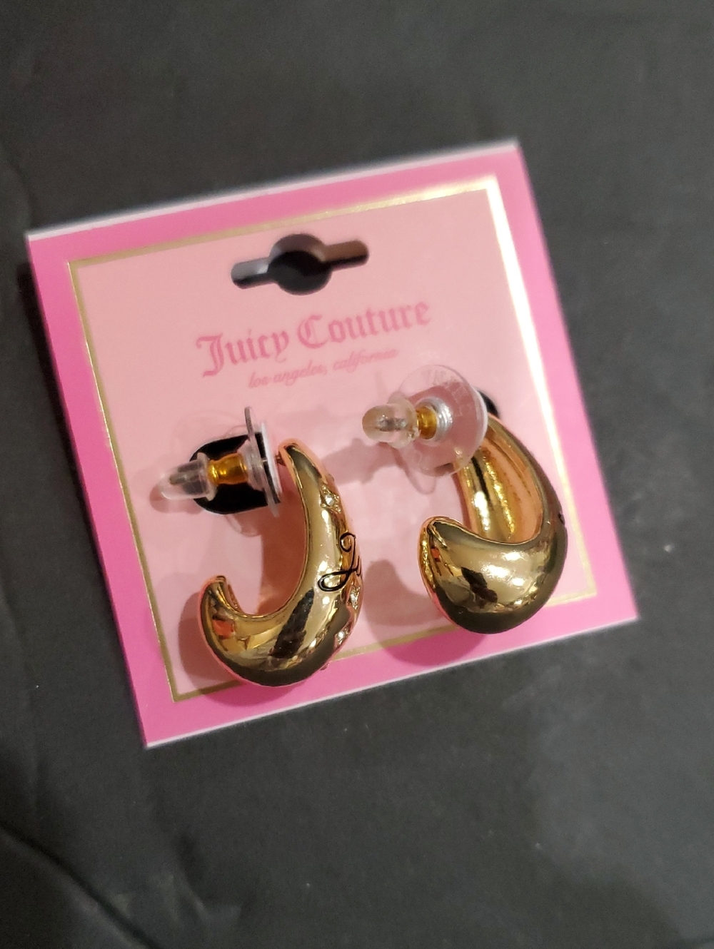 Juicy Couture gold tone engraved crystal  studded kidney huggies shaped earrings